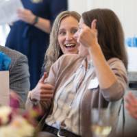 faculty giving thumbs up